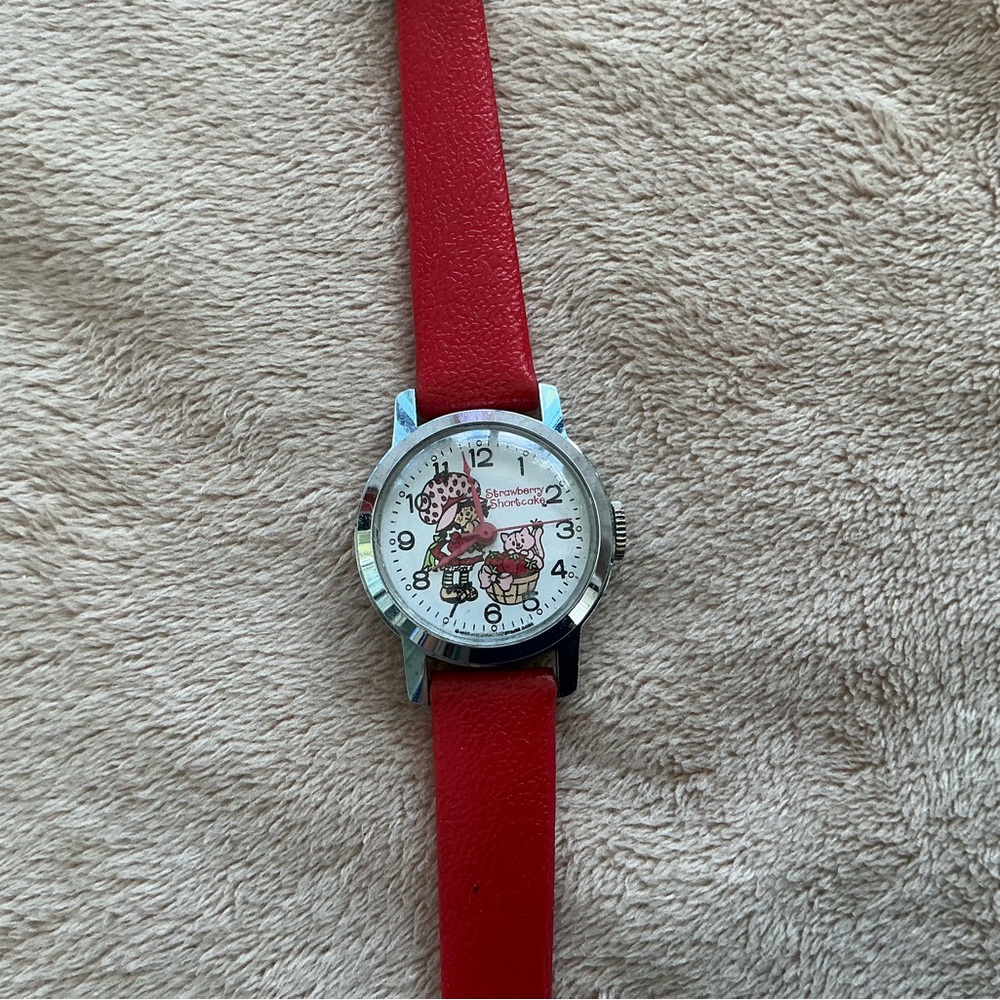 Vintage strawberry shortcake watch. Red Strap Watch with Cartoon Dial